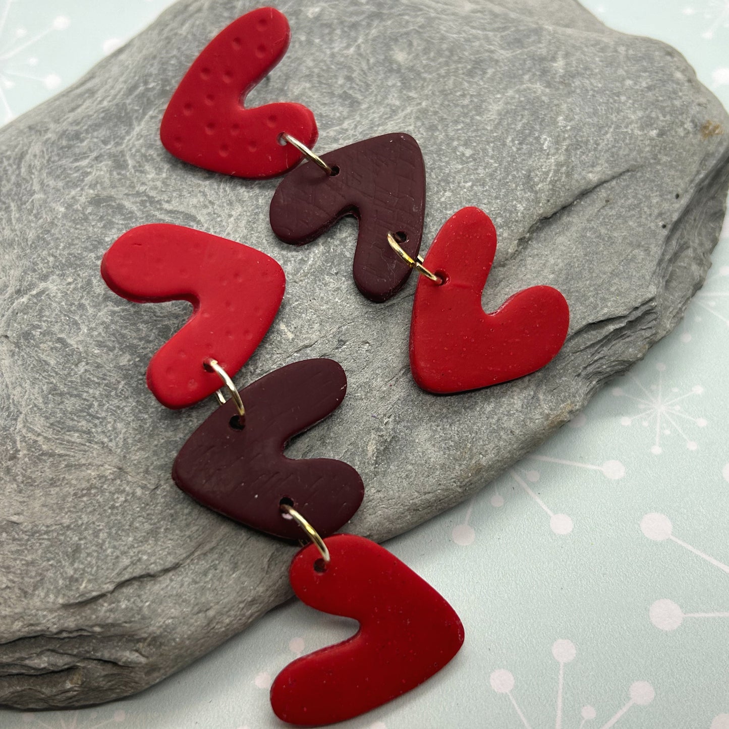 Tumbling hearts earrings - The Argentum Design Co