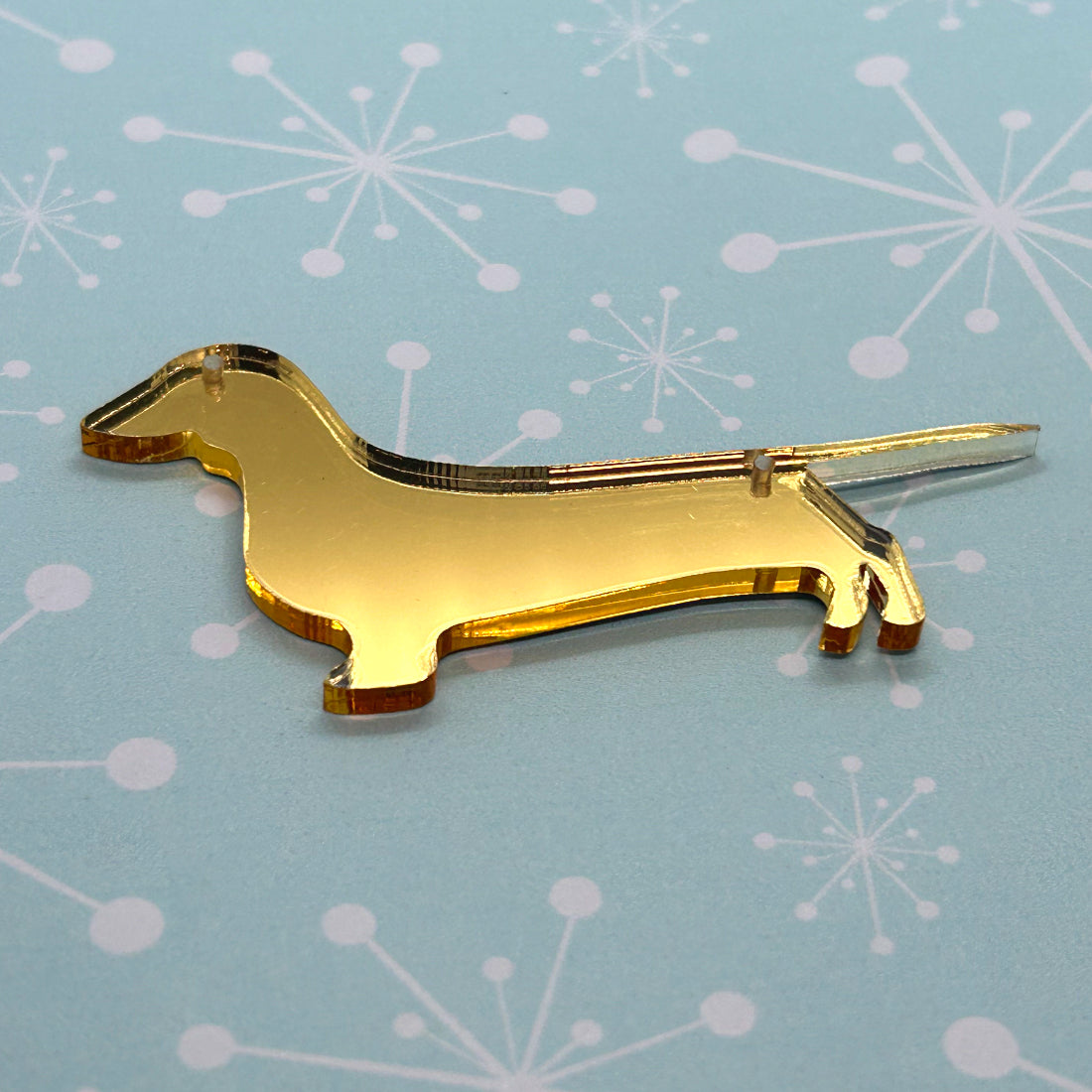 Acrylic sausage dog necklaces and brooches - The Argentum Design Co