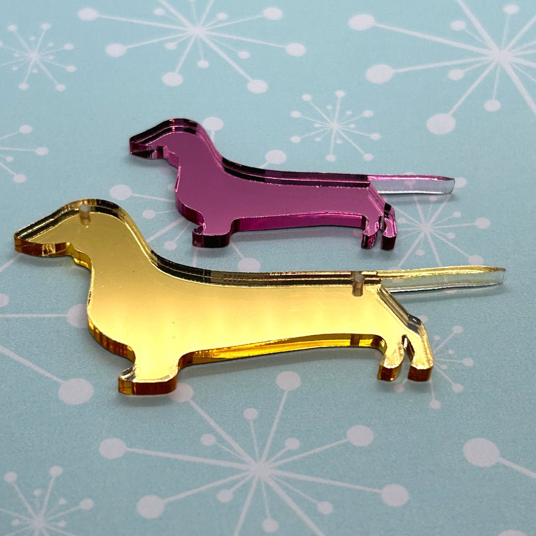 Acrylic sausage dog necklaces and brooches - The Argentum Design Co